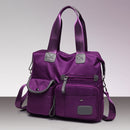 Bolsa Plus Elegance lilás - bolsa feminina transversal de nylon